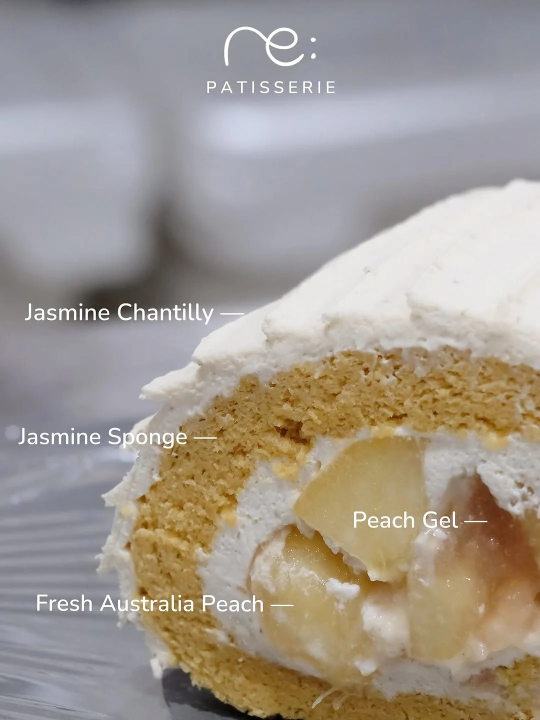 Double Happiness Swiss Roll featuring chestnut and peach flavors, beautifully garnished.