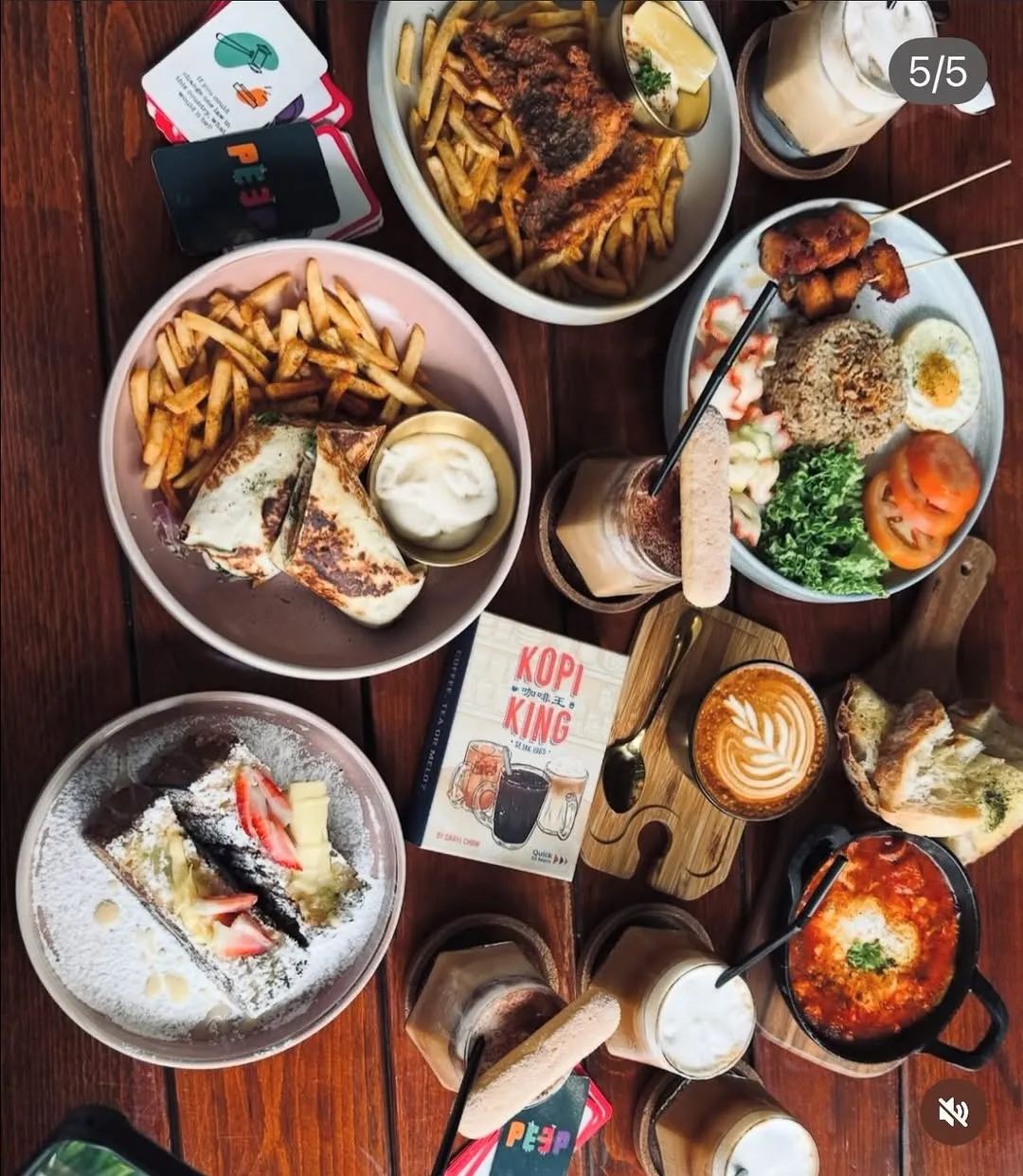 An array of delicious dishes including fried chicken, pasta, and fries.