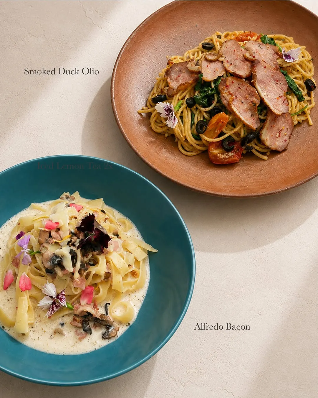 Smoked Duck Olio pasta with smoked duck, spinach, and cherry tomatoes.